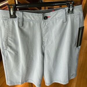 Men’s size 30 hybrid board shorts. New with tags.